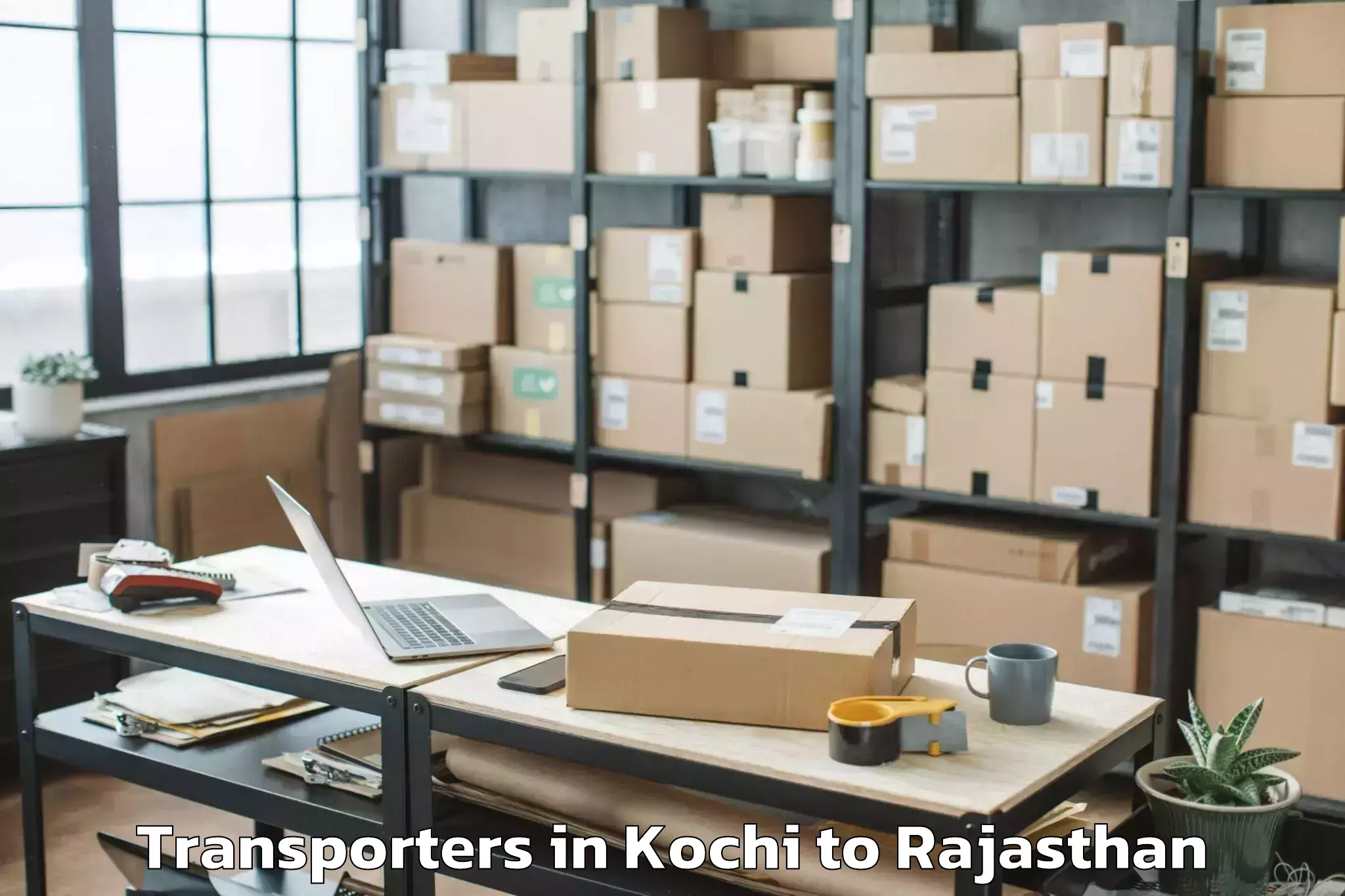 Book Kochi to Rajasthan University Of Health Transporters